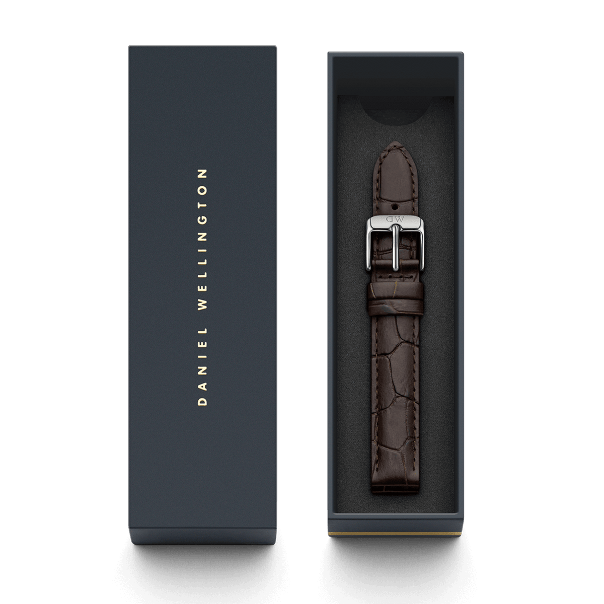 Daniel Wellington Yorkのストラップが、ブランドロゴ入りのネイビーギフトボックスに収められています。ダークブラウンのクロコダイル型押し本革ストラップが、ダークグレーの内装に映え、贈り物にぴったりの上品なパッケージです。