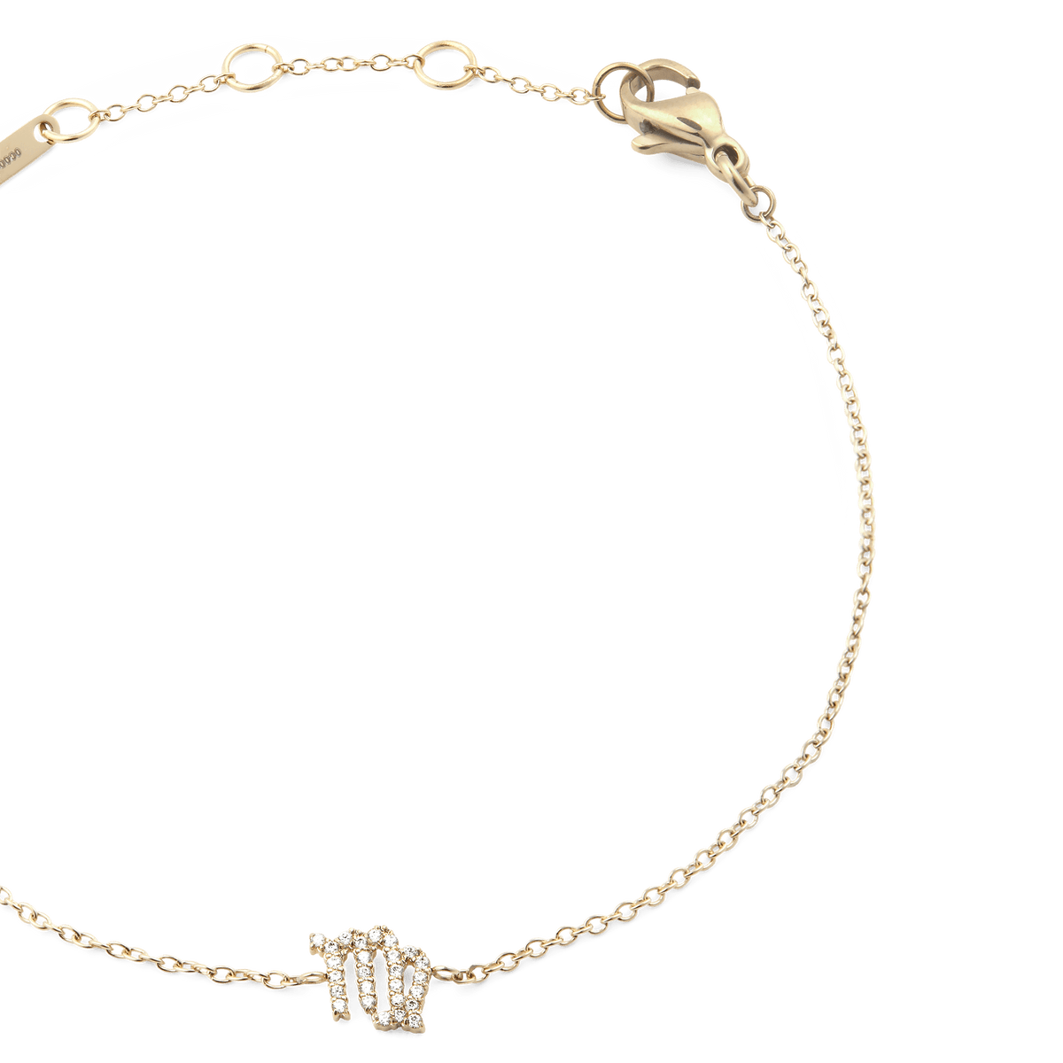 乙女座モデル「Crystal Zodiac Chain Bracelet Gold」のクローズアップ画像です。ゴールドチェーンの中央にあしらわれたクリスタル製の乙女座モチーフが繊細な輝きを放ち、右上にはロブスタークラスプとアジャスターリングが確認できます。