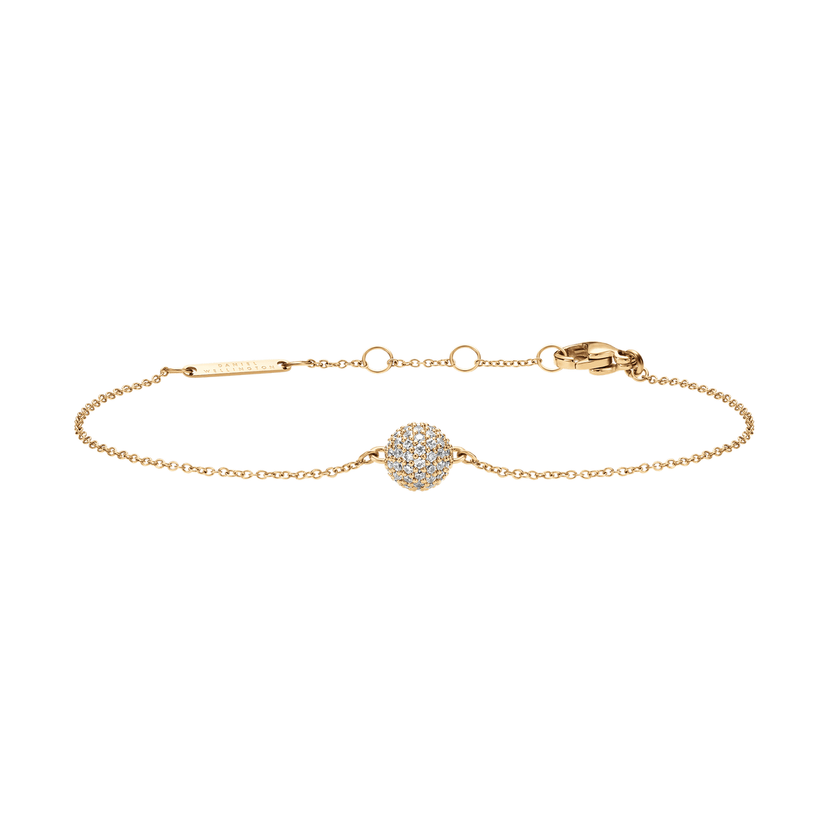ダニエルウェリントンのPavé Crystal Pendant Bracelet Goldです。細身のゴールドチェーンの中央に、CZクリスタルをあしらった球体のペンダントが配置されています。ロブスタークラスプとサイズ調整リング、ブランドロゴ入りプレートも確認できます。