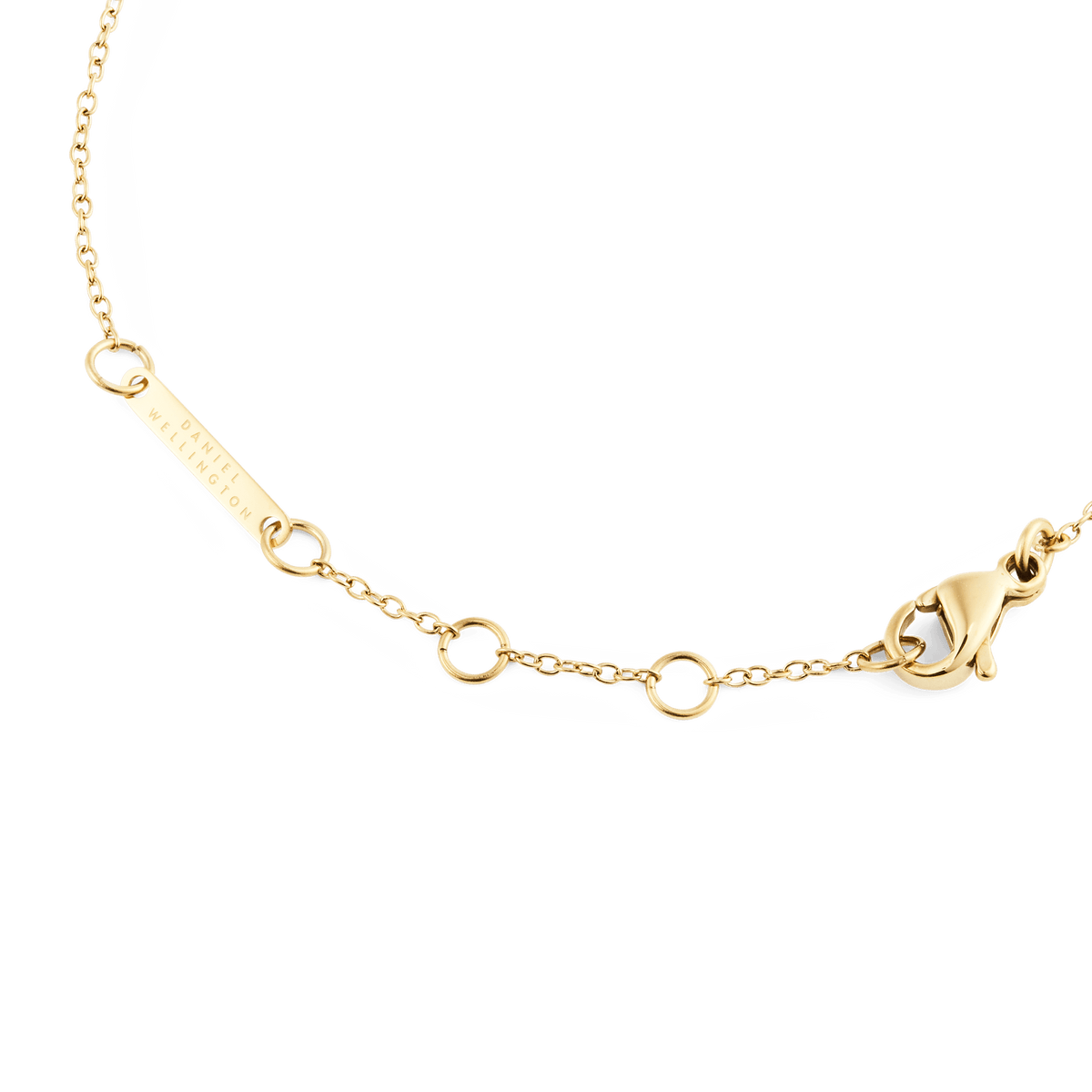 Mirelle Solitaire Bracelet Goldの留め具部分のディテールです。ロブスタークラスプと複数のアジャスターリング、Daniel Wellingtonの刻印が入ったブランドプレートが確認でき、長さ調整の仕組みが分かります。