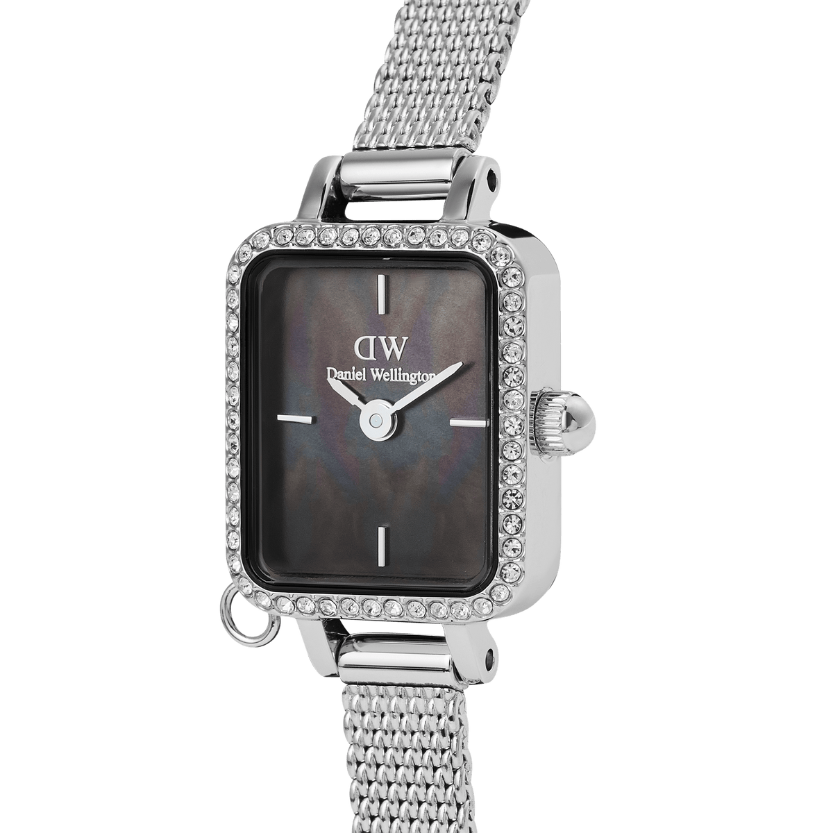 Quadro Mini Crystal Zodiac Sterlingのケースをクローズアップした画像です。ブラックマザーオブパールの文字盤に浮かぶ紫や深緑の繊細な色合いと、ベゼルを一周するクリスタルの輝き、そしてケースサイドにあるチャーム用リングが確認できます。