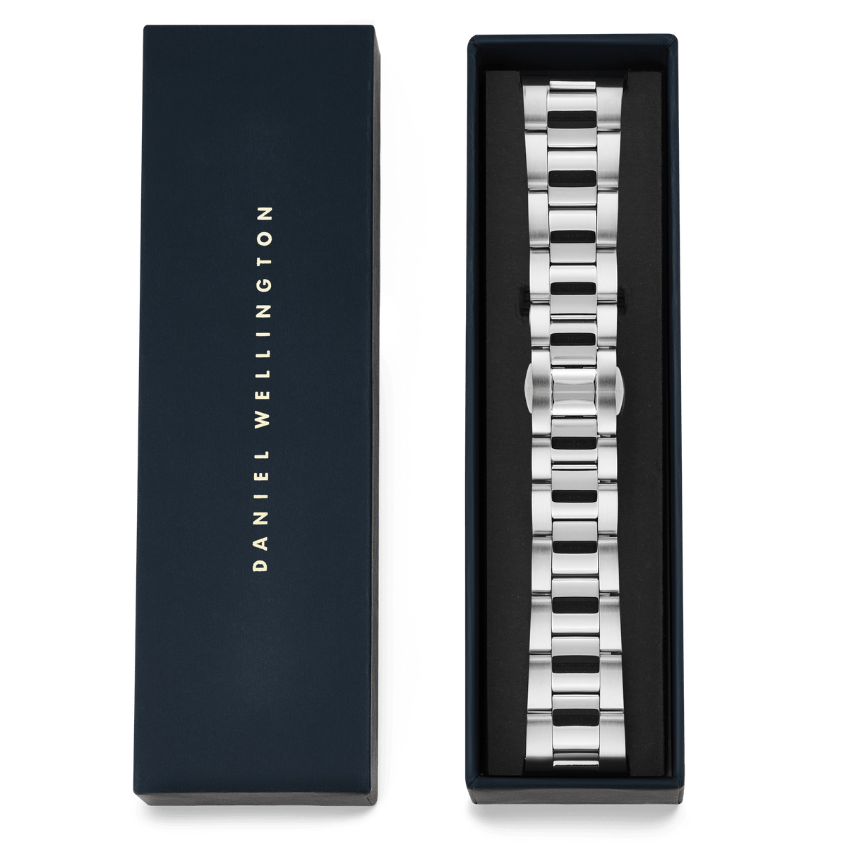 Smartwatch Iconic Linkシルバーのブレスレットが、ネイビーのDaniel Wellingtonブランドボックスに収められたパッケージ画像です。蓋にはゴールドのブランドロゴがあしらわれ、ギフトにもぴったりの上品な仕上がりとなっています。