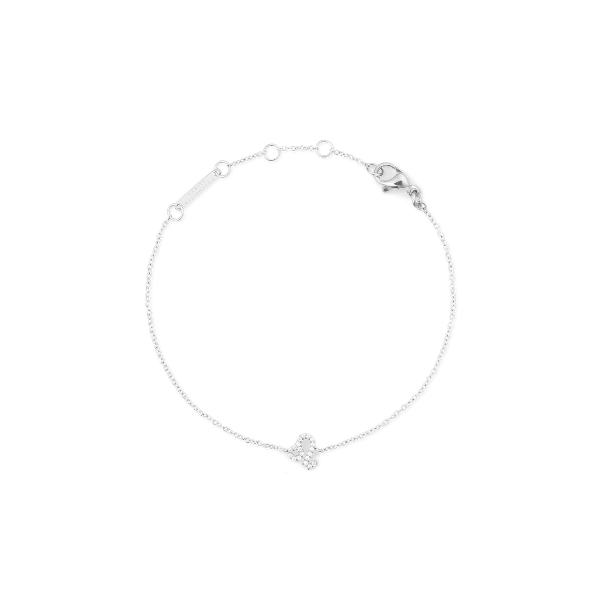 白背景に撮影した、おひつじ座モチーフのCrystal Zodiac Chain Bracelet Silverの全体画像です。細身のシルバーチェーンが円を描くように配置され、キュービックジルコニアであしらわれた牡羊座のシンボルが中央下部で控えめに輝いています。