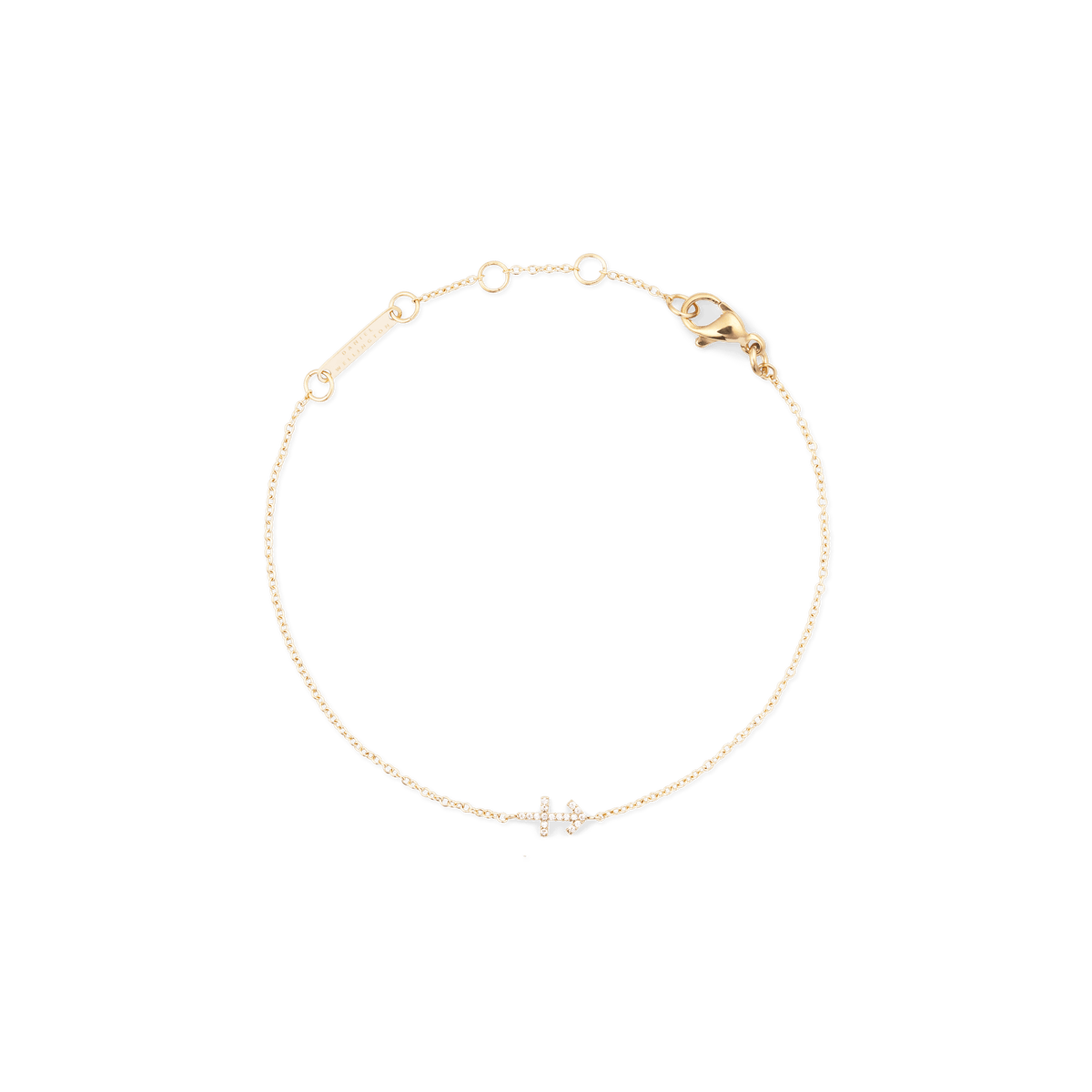 クリスタルをあしらったゴールドのチェーンブレスレット「Crystal Zodiac Chain Bracelet Gold」の商品写真です。繊細なゴールドチェーンが円を描くように白い背景に置かれ、双子座のモチーフを象ったクリスタルが上品に輝いています。アジャスターバーやロブスタークラスプの細部まで確認できます。