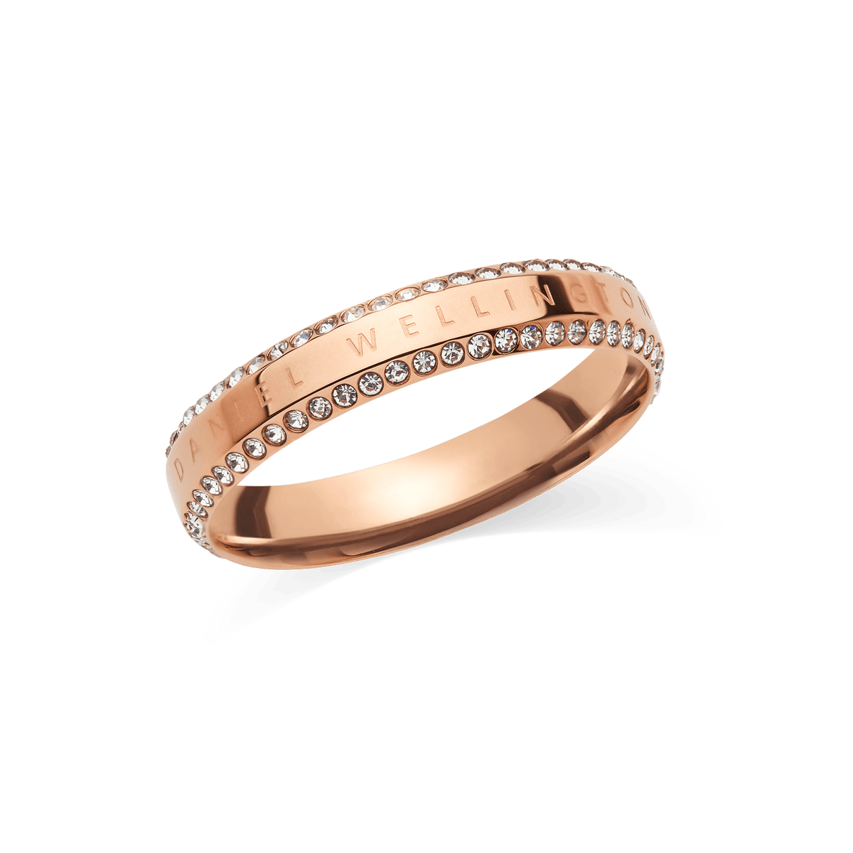 Daniel Wellington Classic Aura Duo Ring ローズゴールドは、ポリッシュ仕上げのバンドの上下両縁にホワイトキュービックジルコニアを2列にあしらい、中央にブランドロゴを刻印したデザインです。