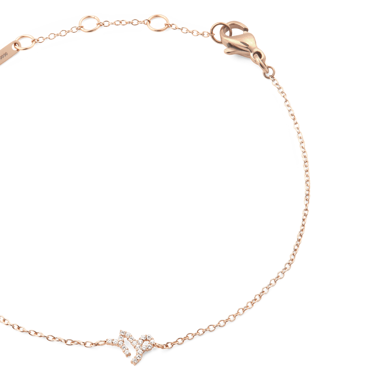 やぎ座のシンボルをクリスタルで表現したペンダントを中心に据えた、Crystal Zodiac Chain Bracelet Rose Goldの接写画像です。細やかなローズゴールドチェーンが優美なカーブを描き、ロブスタークラスプやアジャスタープレートも確認できます。