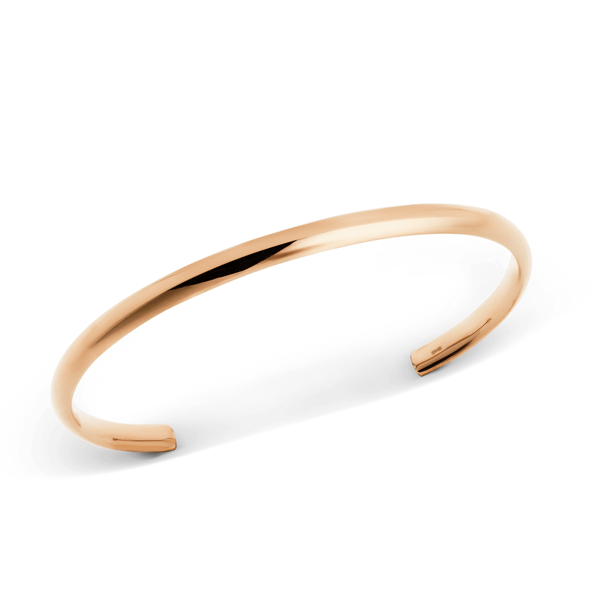 ローズゴールドのアーチカフ(幅4mm)を斜め上から撮影した画像です。ポリッシュ仕上げのローズゴールドが柔らかな光を反射し、細身のシルエットとオープンカフの開口部が確認できます。