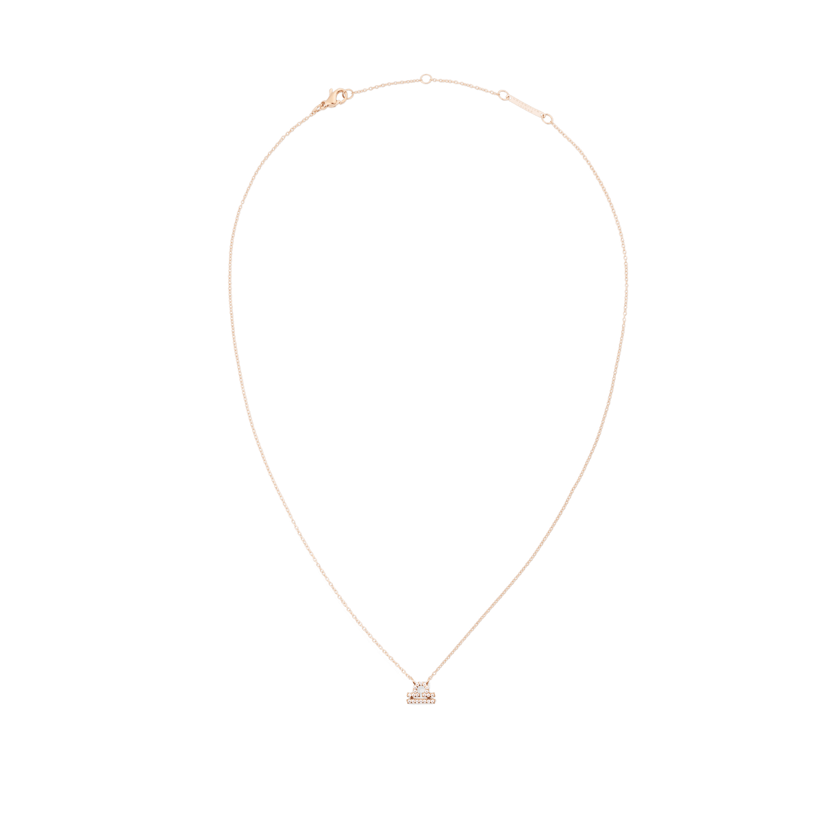 Daniel Wellington Crystal Zodiac Chain Necklace Rose Goldのみずがめ座モデルの全体像。白い背景に、ローズゴールドの細いチェーンが自然なカーブを描き、クリスタルをあしらったみずがめ座のペンダントトップが中央下部に配置されています。