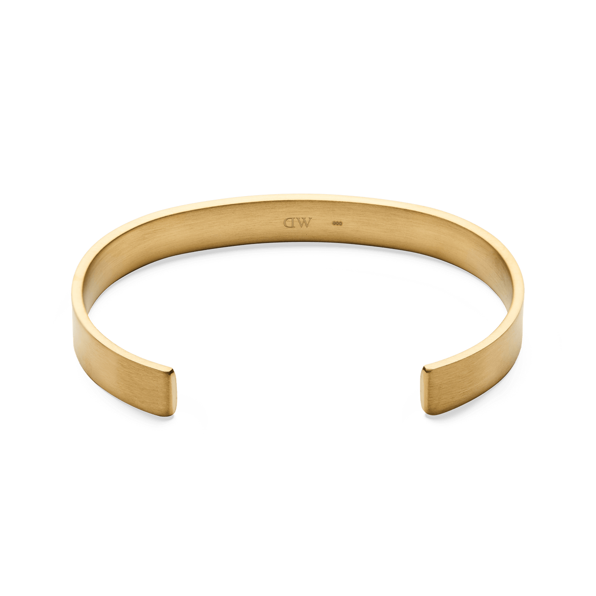 Line Cuff Brushed Goldの内側を捉えたアングルの商品画像です。バンドの内側にはDaniel Wellingtonの刻印が施され、滑らかなカーブの仕上がりがご覧いただけます。