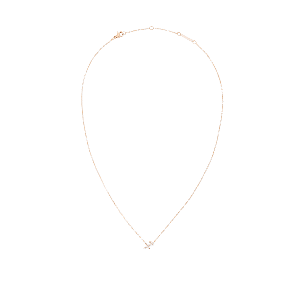 いて座モデルのCrystal Zodiac Chain Necklace(ローズゴールド)の全体像です。白い背景に細身のローズゴールドチェーンが滑らかなループを描き、下部中央にはクリスタルで形作られたいて座のペンダントが配置されています。上部にはロブスタークラスプとアジャスターが確認できます。