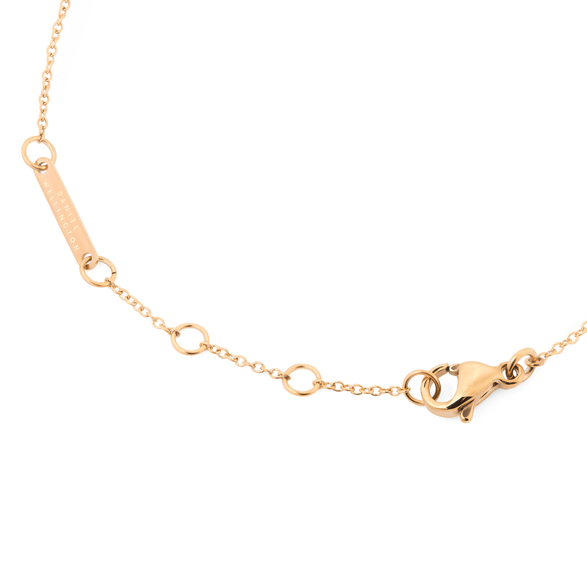 Mirelle Eternity Bracelet Rose Goldの留め具部分には、ローズゴールドのロブスタークラスプと長さ調節用のアジャスターリング、そしてDaniel Wellingtonのブランドロゴが刻印されたプレートが施されています。