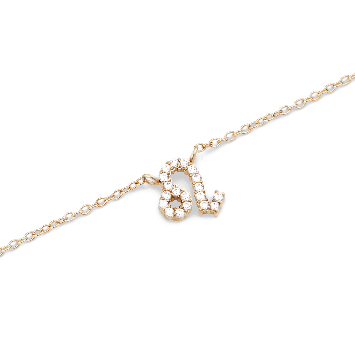獅子座のシンボルをクリスタルで描いた**Crystal Zodiac Chain Necklace Gold**のペンダント部分です。白い背景に映えるゴールドの細身チェーンと、爪留めされたクリスタルの繊細な輝きが際立つディテールをご覧いただけます。