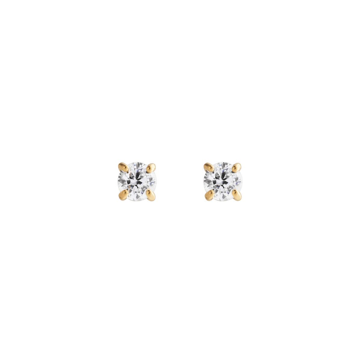 ダニエルウェリントンのMirelle Solitaire Stud Earrings Goldの正面画像です。ホワイトキュービックジルコニアを4本爪のゴールドセッティングで留めた、小ぶりで上品な一粒スタッドピアスです。