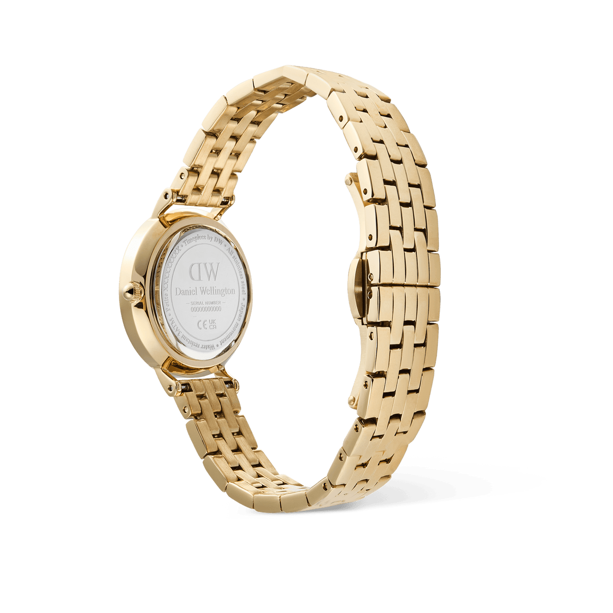 Petite Roman Numerals Date 5-link Goldのケースバック側から撮影した画像です。Daniel Wellingtonのロゴとシリアルナンバーが刻印された裏蓋と、ポリッシュ仕上げの5連ゴールドブレスレットの美しい連なりがご覧いただけます。
