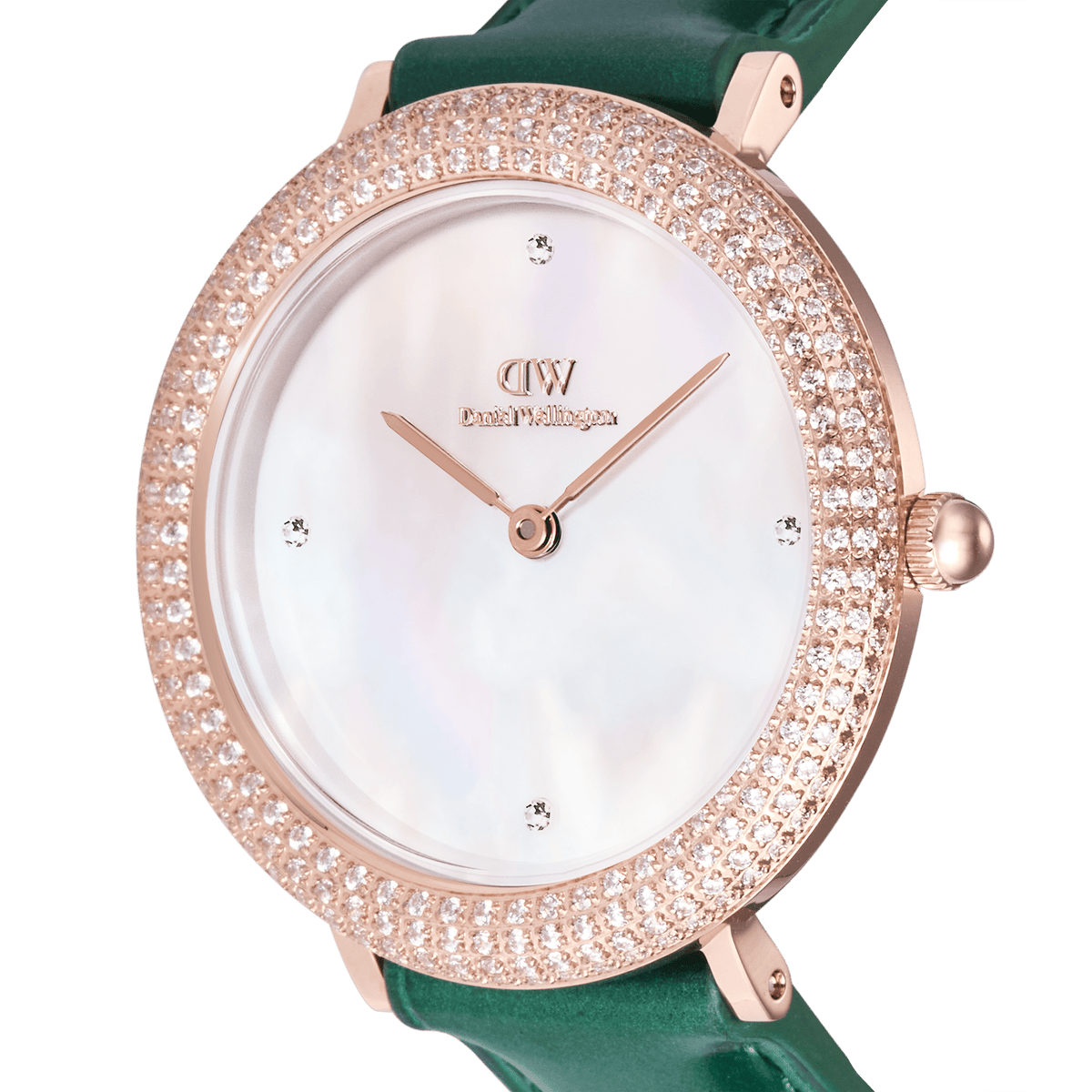 「Crystalline Bezel Green Croc Rose Gold」のダイヤル部分をクローズアップした商品画像です。ホワイトマザーオブパールのやわらかな輝き、12時・3時・6時・9時の位置にあしらわれたプレシオサストーン、ローズゴールドの針とロゴ、そしてベゼルに散りばめられたキュービックジルコニアの煌めきがお楽しみいただけます。