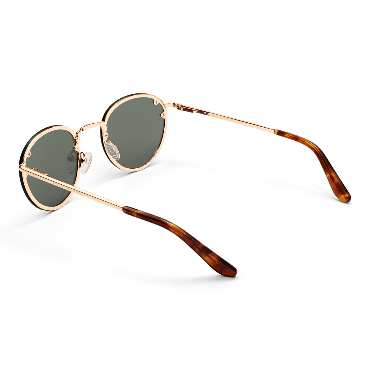 Arch Steel Green Rose Goldを背面から捉えた画像です。透明なシリコン製の調節可能なノーズパッドや、べっ甲調アセテートのテンプルチップの質感が確認でき、掛け心地へのこだわりが感じられるアングルとなっています。