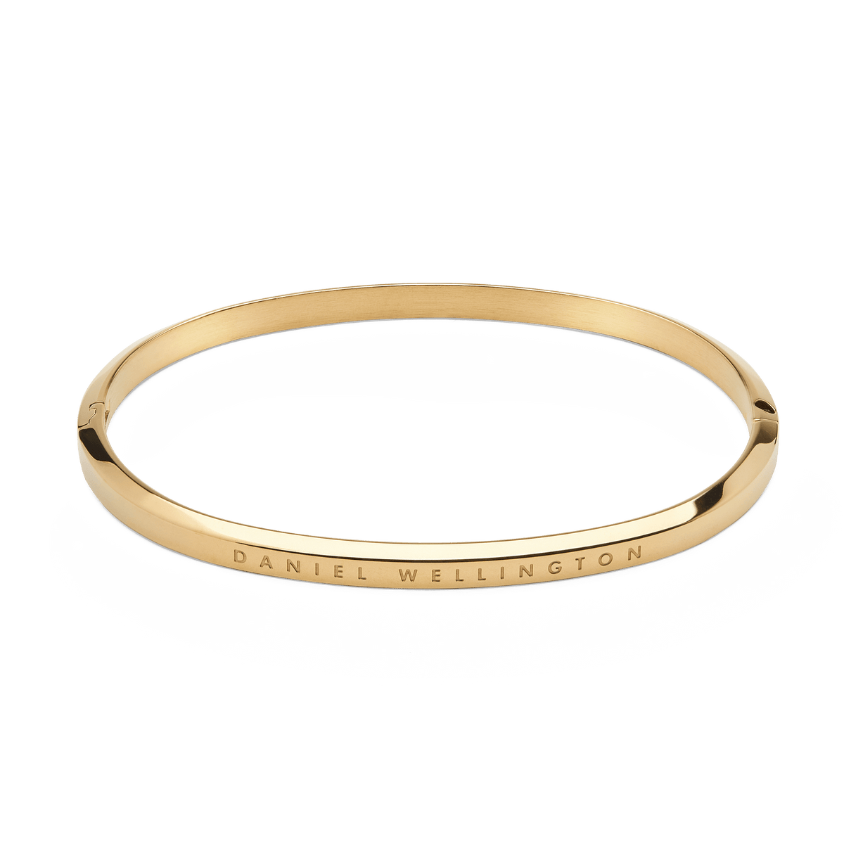 ダニエルウェリントン Classic Bangle Goldを上から撮影した製品画像です。ポリッシュ加工のゴールドカラーが上品な光沢を放ち、表面にはダニエルウェリントンのロゴが刻印された細身のバングルです。