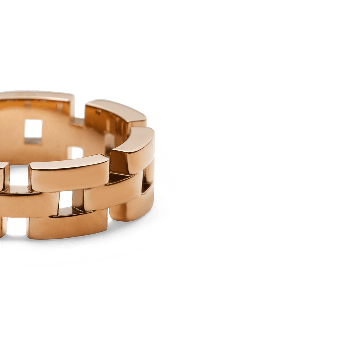 Daniel Wellingtonの3-Link Ring ローズゴールドをクローズアップでご紹介。ポリッシュ仕上げのローズゴールドメッキが光を滑らかに反射し、3連リンクの精巧な接合部分やリンク間のディテールが際立ちます。