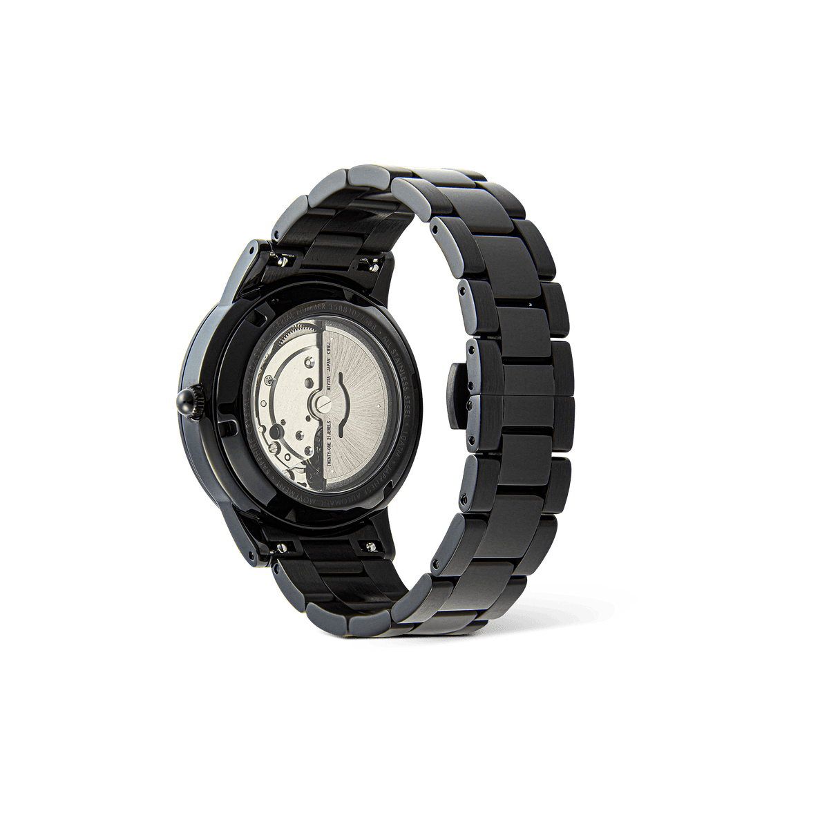Iconic Link Automatic Blackの裏面を捉えた画像です。サファイアガラスのエキシビションケースバック越しに、自動巻きムーブメントのローターや歯車が見え、ブラック仕上げのリンクブレスレットのヘアラインとポリッシュの質感が際立っています。