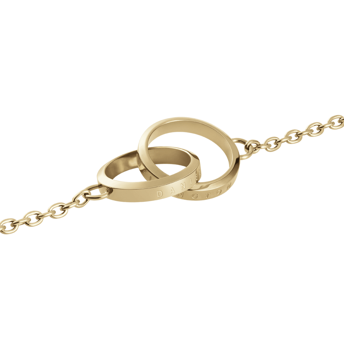 Elan Unity Necklace Goldのインターロッキングモチーフ部分をクローズアップした画像です。ポリッシュ仕上げのゴールドリング2つが交差し、リング側面にはDaniel Wellingtonのロゴが刻印されています。