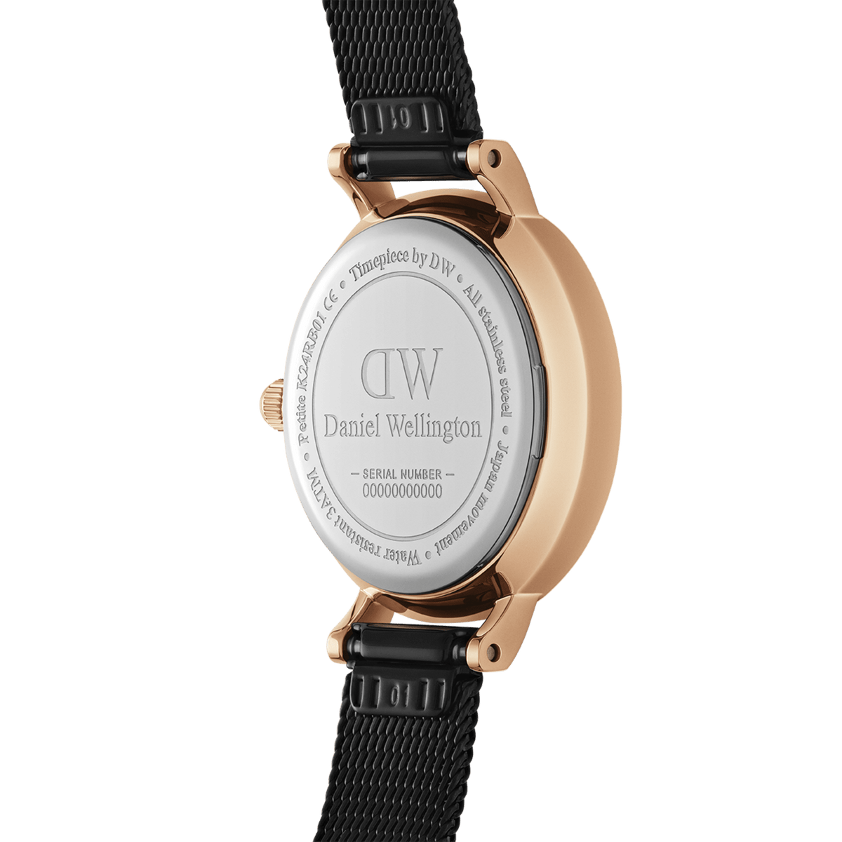 Petite Pressed Ashfieldの裏蓋側を撮影した画像です。ステンレススチール製の裏蓋にはDaniel Wellingtonのロゴとシリアルナンバーが刻印されており、ローズゴールドのケースとブラックメッシュストラップの接続部分が確認できます。