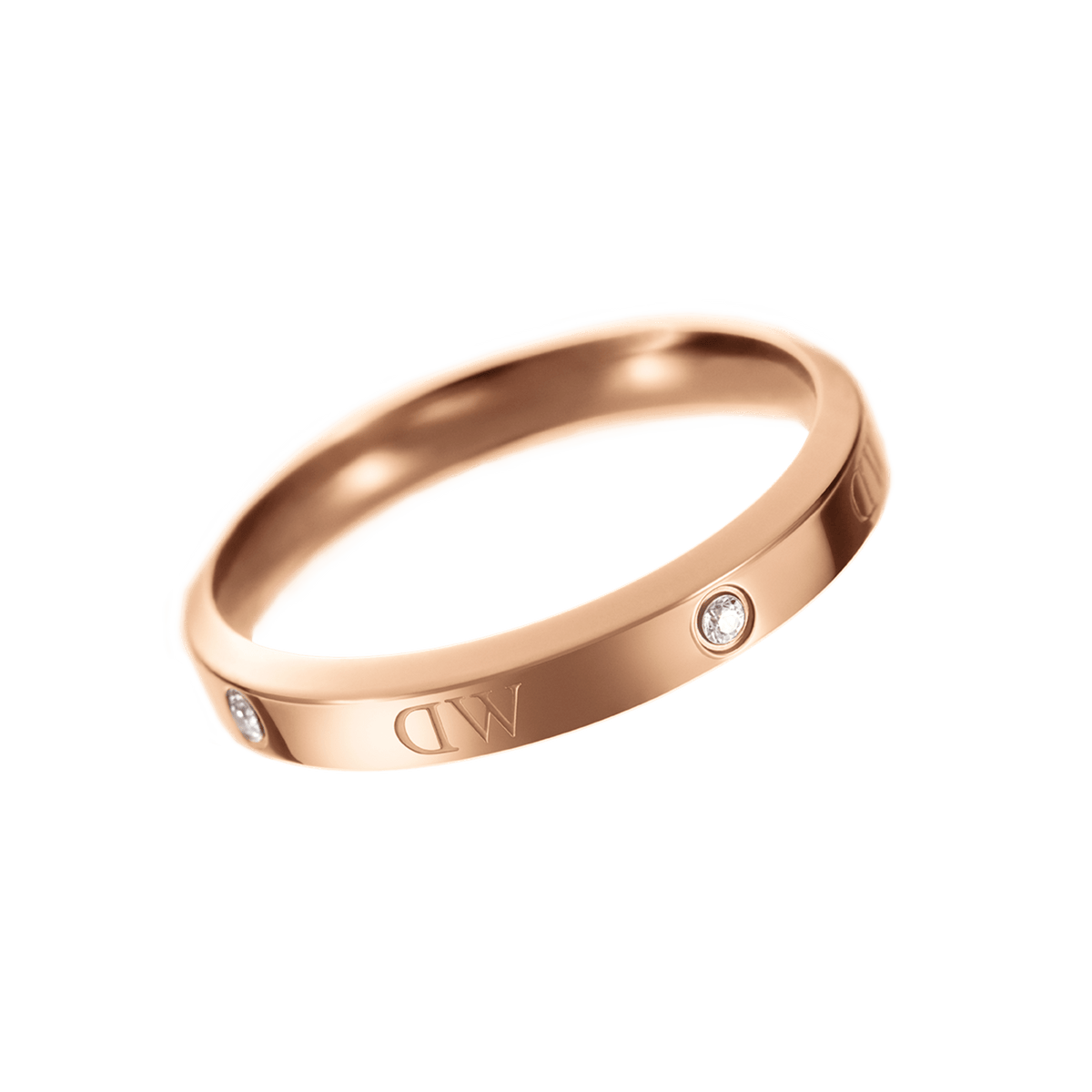 クラシックなLumine Ring Rose Goldを斜め上から撮影した画像です。ローズゴールドの滑らかなバンド表面にはロゴが刻印され、等間隔に埋め込まれたクリスタルの輝きが確認できます。