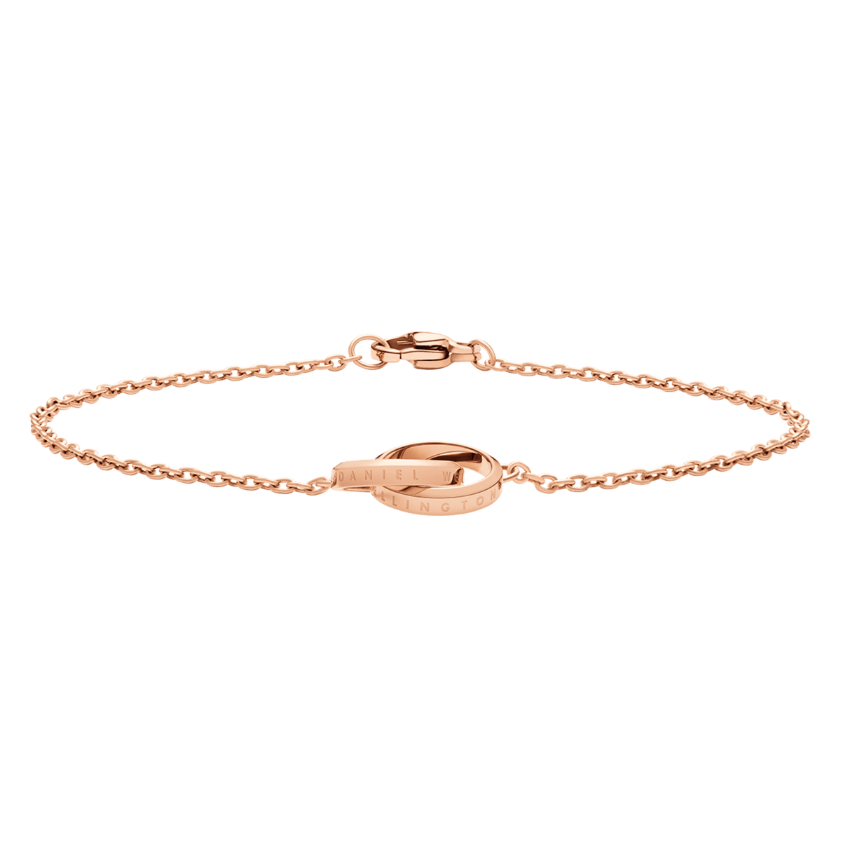 Elan Unity Bracelet ローズゴールドを正面から捉えた画像です。ケーブルチェーンが自然なアーチを描いて広がり、中央のDaniel Wellingtonロゴが刻まれたインターロッキングリングとロブスタークラスプの輝きが際立っています。
