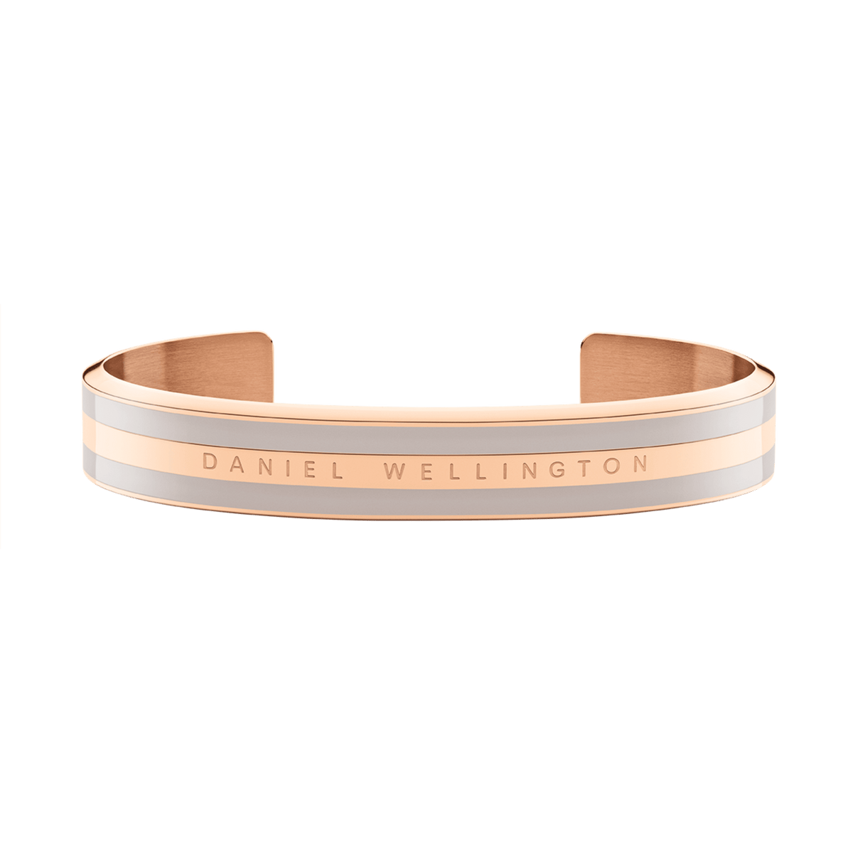 Daniel WellingtonのEmalie Bracelet Desert Sand Rose Goldの正面画像です。ローズゴールドのステンレススチールとデザートサンドカラーのエナメルが交互に配されたカフブレスレットで、中央にはブランドロゴが刻印されています。