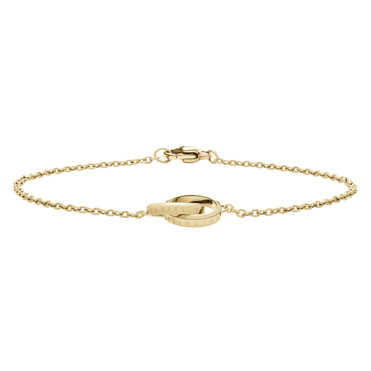 Elan Unity Braceletを横から捉えた商品画像です。ゴールドのケーブルチェーンが手首に沿う自然なラインを描き、中央のインターロッキングリングにはDaniel Wellingtonのブランド名が刻印されています。