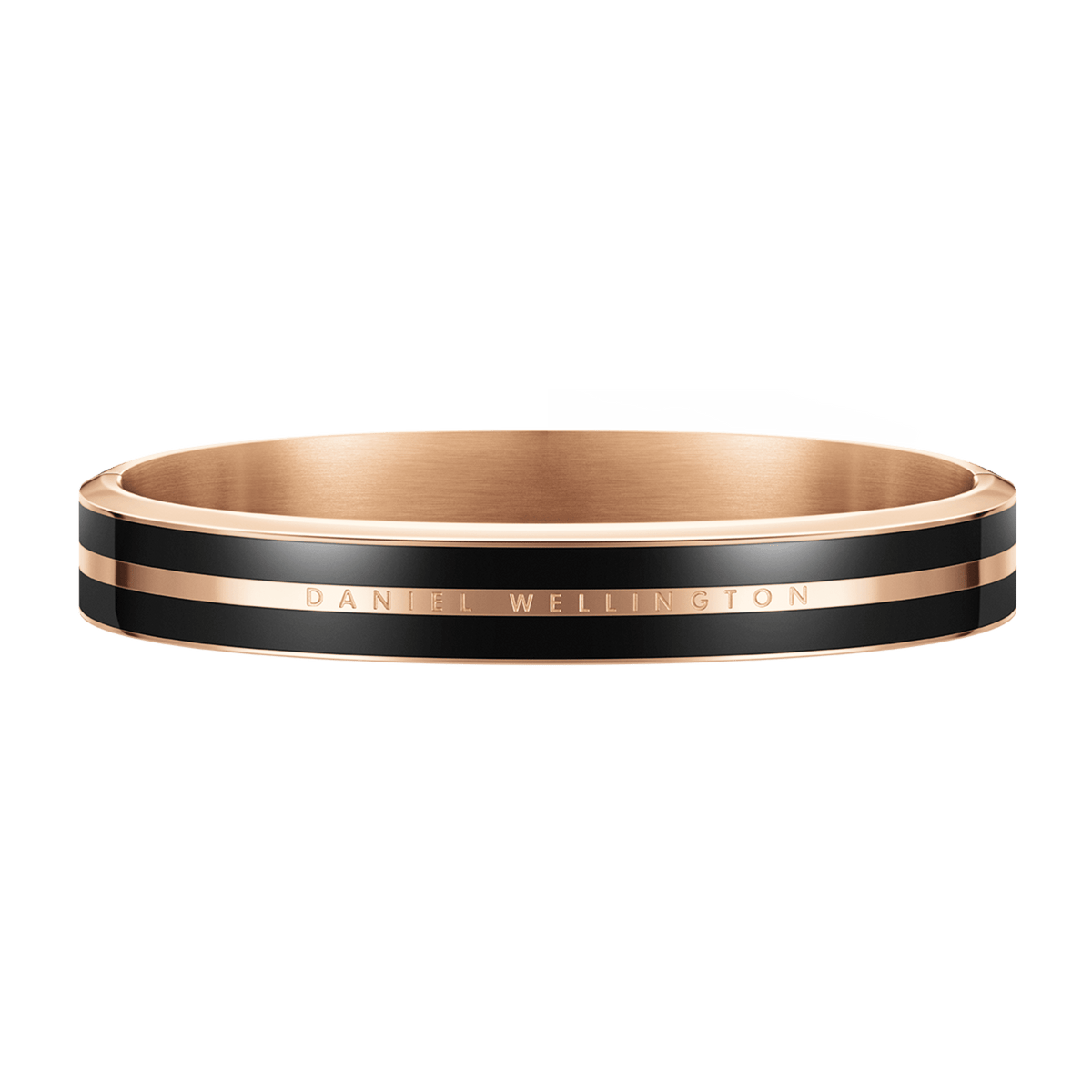 Emalie Infinite Rose Gold Blackバングルを低いアングルから撮影した画像です。ブラックエナメルとローズゴールドのコントラストが美しいストライプデザイン、中央に刻印されたDaniel Wellingtonのロゴ、内側のサテン仕上げのローズゴールドが確認できます。