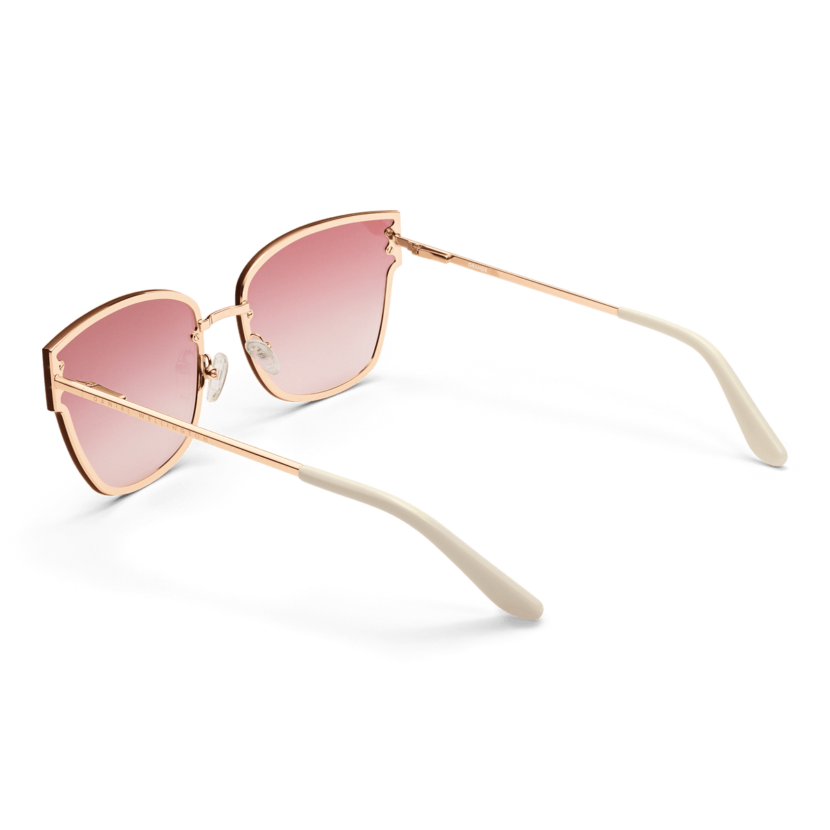 Grande Steel Pink Gradient Rose Goldを背面から捉えたアングルです。ピンクグラデーションのレンズとローズゴールドのフレームが持つ繊細な質感が際立ち、透明なシリコン製ノーズパッドやクリーム色のテンプルチップの形状もはっきりと確認できます。