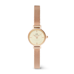 Daniel Wellington Petite Mini Champagne Melroseの正面画像。19mmのローズゴールドケースに、シャンパンカラーのサンレイダイヤルとローズゴールドのメッシュストラップを組み合わせた、コンパクトな女性向け腕時計です。