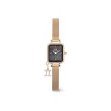 ふたご座のゾディアックチャームが付いたQuadro Mini Crystal Evergoldの商品画像です。キュービックジルコニアであしらわれたふたご座のモチーフがケースサイドのリングから揺れ、クリスタルベゼルとブラックマザーオブパールの文字盤、ゴールドメッシュストラップが上品に調和しています。
