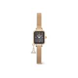 Quadro Mini Crystal Evergoldの商品画像です。てんびん座のゾディアックチャームをあしらったデザインで、ゴールドのスクエアケースをクリスタルベゼルが華やかに彩ります。ブラックマザーオブパールの文字盤は深みのある輝きを放ち、キュービックジルコニアで描かれたてんびん座のチャームがケース下部で揺れます。細やかなゴールドメッシュストラップと調和し、上品で洗練された佇まいです。