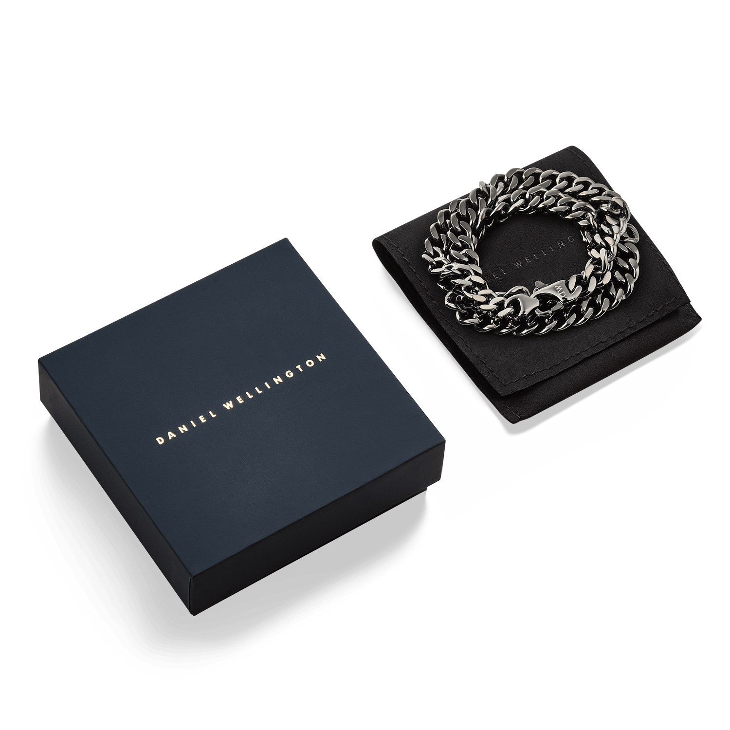 Ellipse Cuban Chain Necklace Graphiteが、ブランドロゴ入りのネイビーボックスとブラックポーチに収められたギフトパッケージの画像です。贈り物にぴったりの上品な仕様をご確認いただけます。