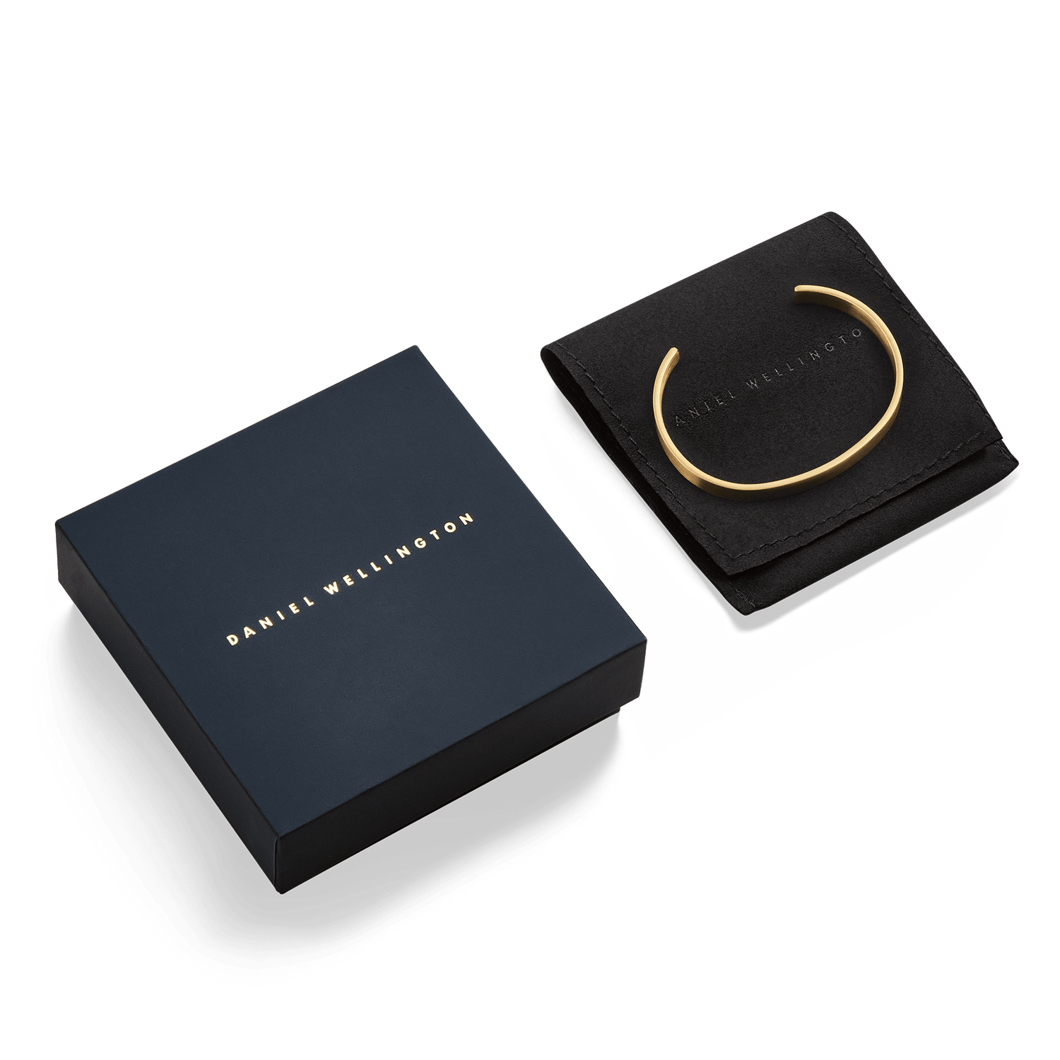 Line Cuff Brushed Goldとダークネイビーのギフトセットです。ブランドギフトボックスとブラックのスエード調ポーチが付属し、贈り物にも最適な上品なパッケージとなっています。