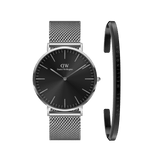 Daniel WellingtonのClassic Mesh Onyxは、オニキスブラックの文字盤とシルバーメッシュストラップがスタイリッシュな腕時計です。ブラック仕上げのClassic Braceletカフとセットになったギフトにも最適なアイテムです。