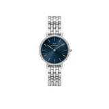 ダニエルウェリントン Petite Lumine Bezel 5-Link Arcticの正面画像。クリスタルベゼルに囲まれたアークティックブルーのサンレイダイヤルと、シルバーカラーのポリッシュ仕上げ5リンクブレスレットをあしらった28mmのレディースウォッチです。