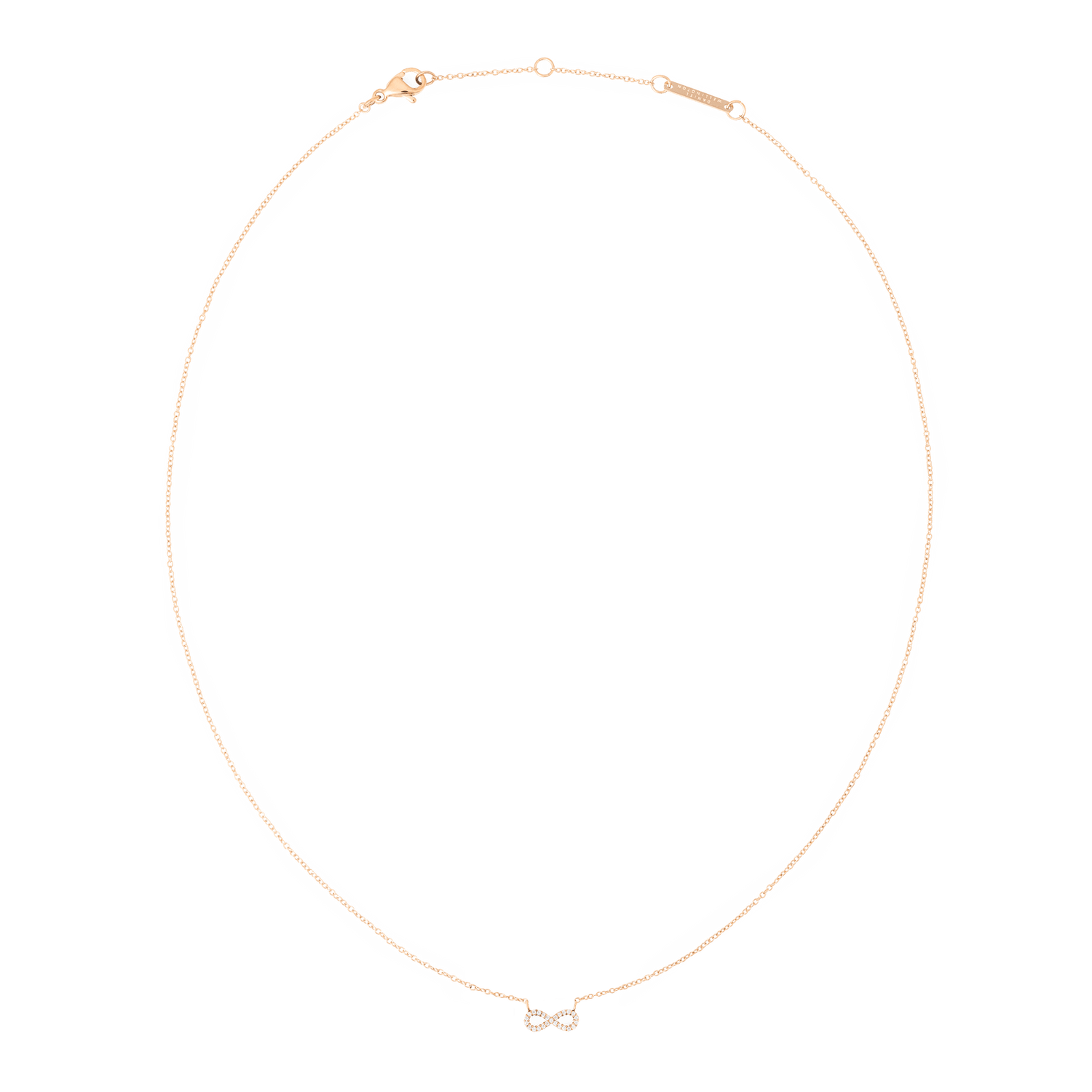 Daniel WellingtonのMirelle Infinity Necklaceを全体的にご覧いただけます。細身のローズゴールドチェーンの中央に、キュービックジルコニアをあしらったインフィニティモチーフが配されています。ロブスタークラスプと、ブランドロゴが刻印された延長チェーンも確認できます。