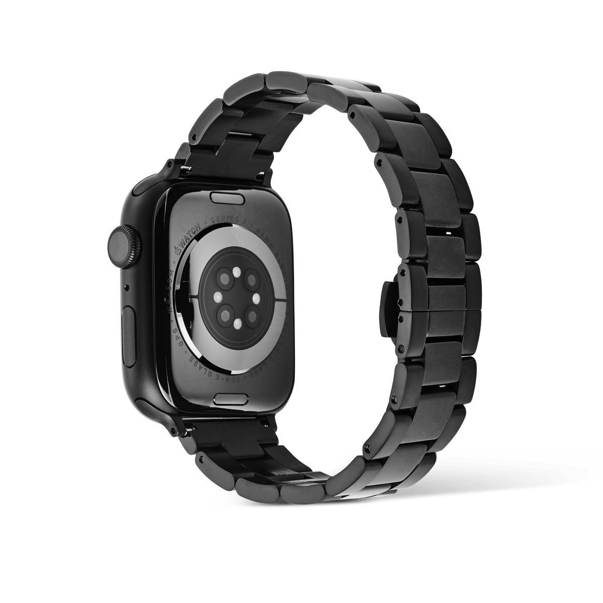 Daniel Wellington Smartwatch Iconic Link Onyxを装着したApple Watchを背面から撮影した画像です。センサー部分が見える裏蓋を中心に、ブラックPVDコーティングの3連リンクブレスレットがループ状に広がっています。手首側に向かってリンク幅が細くなるテーパードシルエットも確認できます。