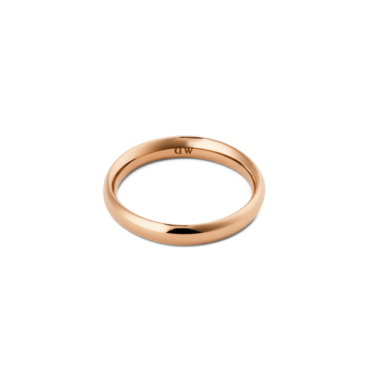 Arch Ring Rose Gold 3.5mmを正面やや上から撮影した画像です。内側にはDaniel Wellingtonの刻印が確認できます。角のない滑らかな曲面が光を受け、ローズゴールドの上品な輝きが白い背景に映えています。