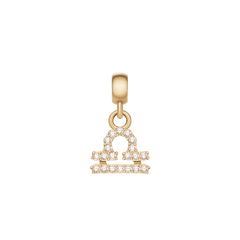 てんびん座のCrystal Zodiac Charm Gold。天秤のシンボルをモチーフにしたラインにキュービックジルコニアが輝き、ゴールドのベイルとともに白背景で撮影された商品画像です。