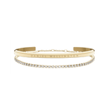Daniel WellingtonのClassic Braceletとテニスブレスレットのゴールドセットです。ブランド名が刻印されたポリッシュ仕上げのカフと、クリスタルが連なるテニスブレスレットを組み合わせ、二重のラインが美しい重ね付けスタイルをお楽しみいただけます。