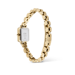 Quadro Mini Arch Emerald Sunray Goldを裏蓋側から見た画像です。ステンレススチール製の裏蓋にはDaniel Wellingtonのロゴやシリアルナンバーが刻印されており、ゴールドのアーチ型3リンクブレスレットが円を描くように配置されています。