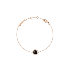 Daniel Wellington Audrey Bracelet Black Agathe Rose Goldの全体像。ドーム型のブラックアゲートを中央に配置し、ホワイトキュービックジルコニアのヘイローとローズゴールドの細いチェーンが調和したデザインです。ロブスタークラスプとサイズ調節リングも確認できます。