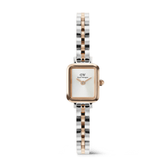 Daniel Wellington Quadro Mini Archのツートンカラーモデルです。ローズゴールドのレクタンギュラーケースに白い文字盤、シルバーとローズゴールドが交互に輝くアーチ型3リンクブレスレットが特徴の女性向け腕時計です。