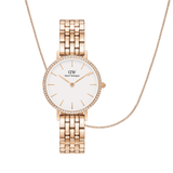 Daniel WellingtonのPetite Lumine Bezel ローズゴールド 5リンク Melroseブレスレット腕時計とボックスチェーンネックレスのセットです。クリスタルベゼルがあしらわれたホワイトダイヤルと、統一感のあるローズゴールドトーンのネックレスがセットになっています。