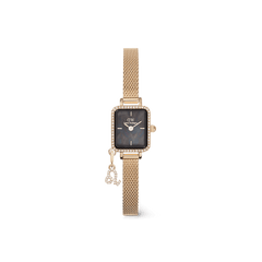 Daniel WellingtonのQuadro Mini Crystal Zodiac Evergold Setは、ゴールドのスクエアケースにクリスタルベゼルをあしらい、ブラックマザーオブパールの文字盤とゴールドメッシュストラップを組み合わせたデザインです。しし座のゾディアックチャームがアクセントとなり、個性的な印象を演出します。
