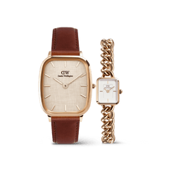 ダニエルウェリントンのMarlon & Jolie Chain ローズゴールド ペアウォッチセット。ブラウンレザーストラップをあしらったクッションケースのMarlonと、ローズゴールドのカーブチェーンストラップが特徴のコンパクトなスクエアケースのJolie Chainを並べたデザインです。