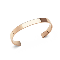 ローズゴールドの鏡面仕上げが光を受けて柔らかく輝く、Line Cuff Polished Rose Goldの斜め上からのアングル写真です。装飾のないフラットな表面とオープンカフの形状がはっきりと確認できます。